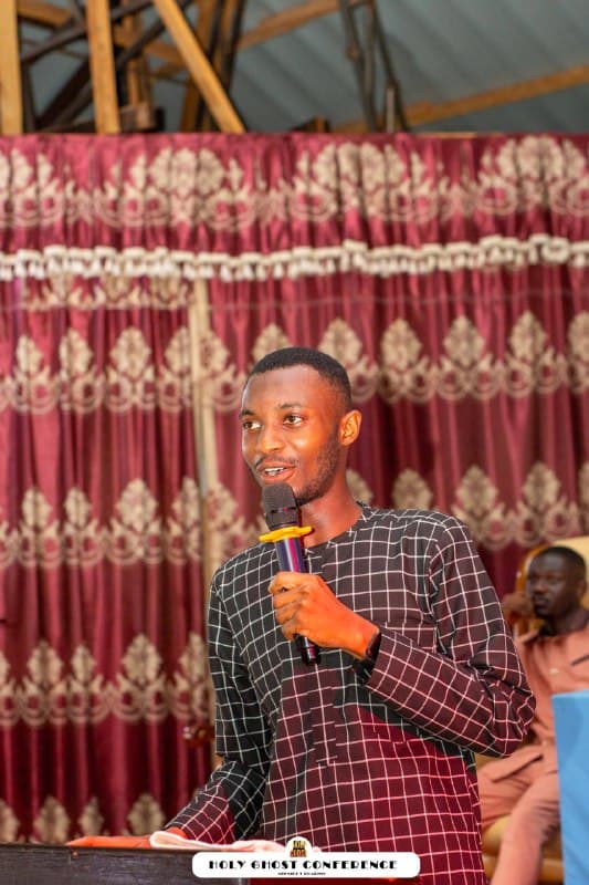 A young speaker addressing the Holy Ghost Conference